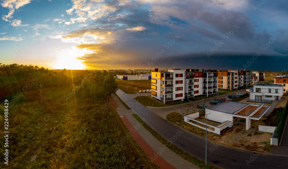 View from above on real estates in Ostrow Wielkopolski in Poland, during dynamic weather.