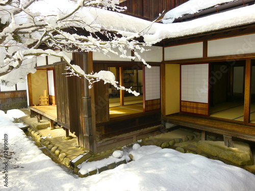 The snow covered Japanese traditional house in old town, Japan photo