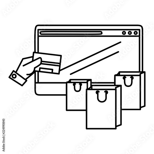 computer with credit card and shopping bags