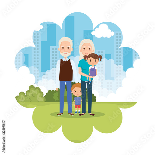grandparents with grandson and granddaughter in park