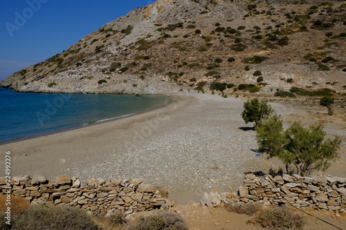 Fototapeta Naklejka Na Ścianę i Meble -  Island of Syros in greece, panorama of Varvarousa beach  with sand land and sea. Tamarix plants for a bit of shadow