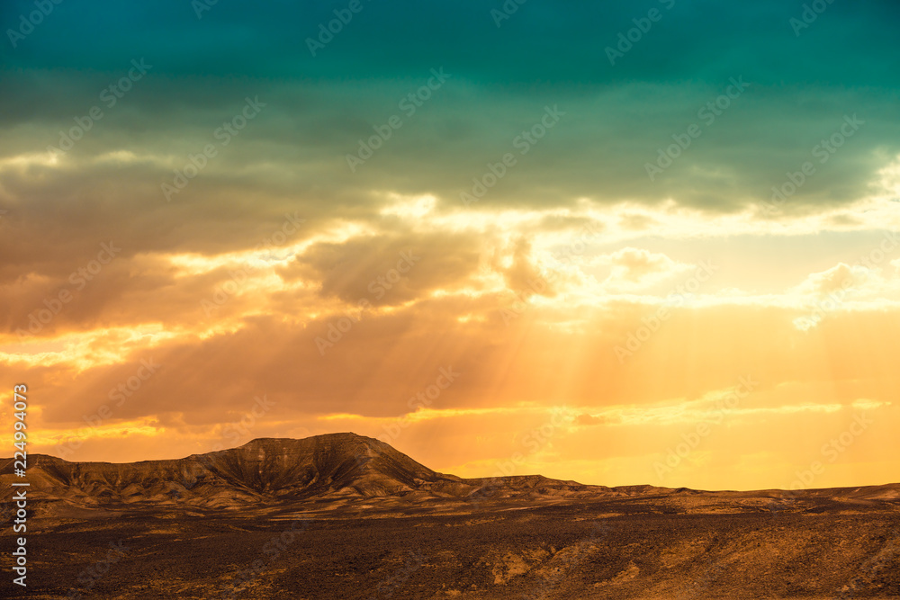 Magic sunset over the mountain in Negev desert, wild nature Israel