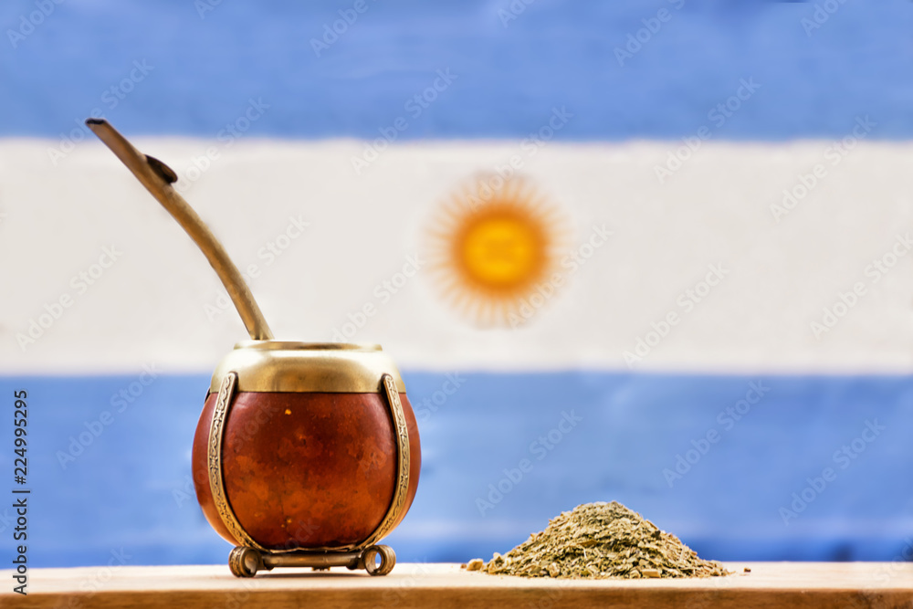 mate, mate grass (yerba mate) with flag of Argentina in the background  Stock Photo | Adobe Stock