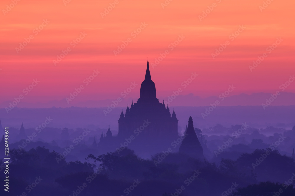 Silhouette of ancient pagode temples with fog after sunrise at Bagan in Myanmar