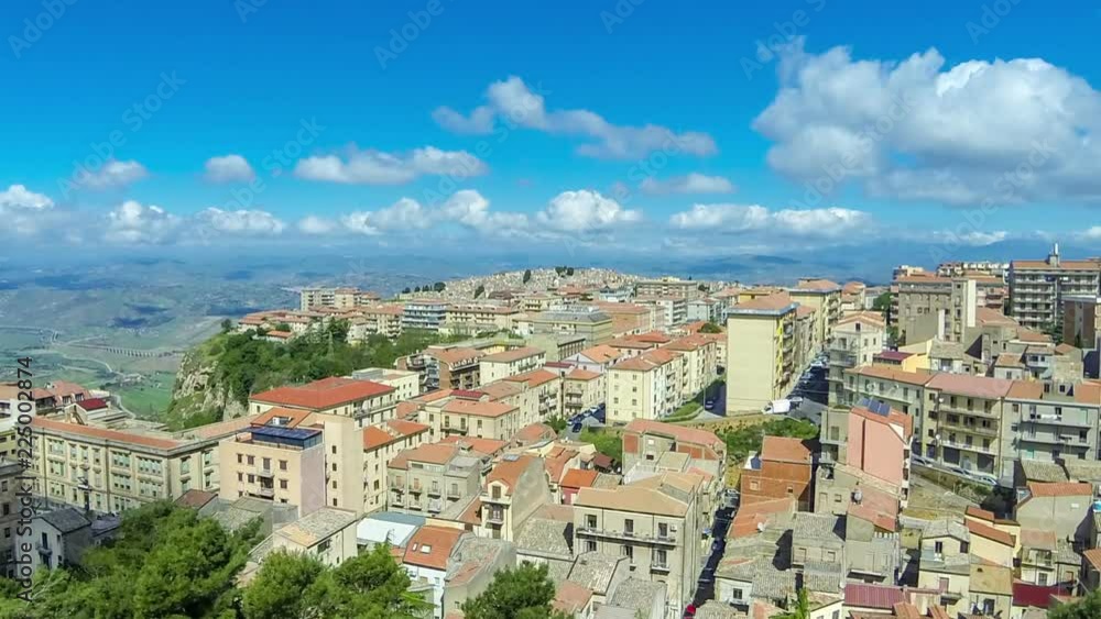 Aerial view of Enna old town, Sicily, Italy. Enna is a city and comune located at the center of Sicily. At 931 m above sea level, Enna is the highest Italian provincial capital. Time Lapse Aerial view of Enna old town, Sicily, Italy. Enna is a city and comune located at the center of Sicily. At 931 m above sea level, Enna is the highest Italian provincial capital. Time Lapse