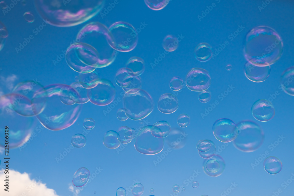Giant soap bubbles floating in the air