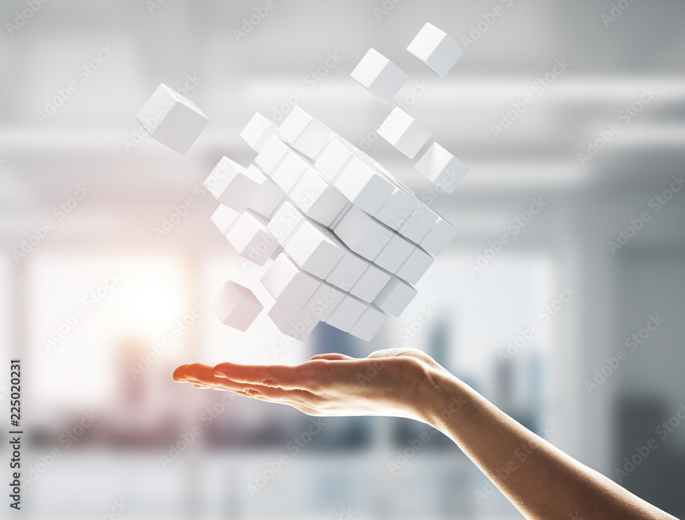 Cube white figure in male palm as symbol for integration. 3D ren