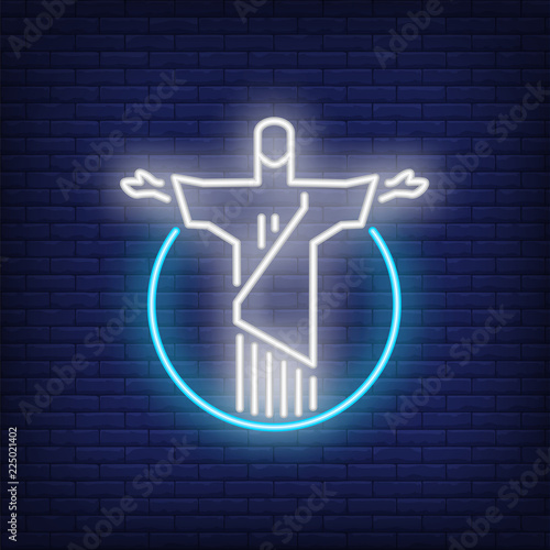 Christ the reedemer neon sign. Luminous signboard with statue. Night bright advertisement. Vector illustration in neon style for Rio de Janeiro vacation, tourism, religion photo