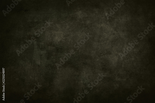 dark green stained grungy background or texture