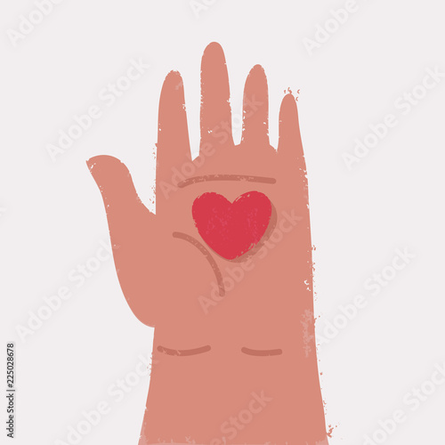 Heart in the palm isolated on white background