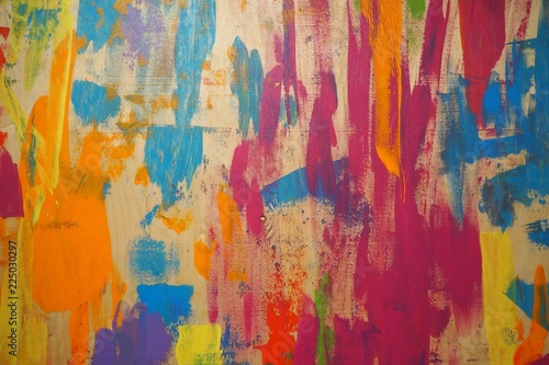 Wood texture painted with blue, red, green, purple paint. Blue painted wood. Painted wood background. Colorful wood wall