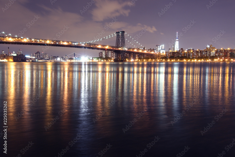 The Williamsburg bridge and Manhattan at night, New York.