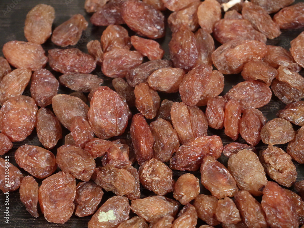 close up of pile of raisins on white background, Kismish, Munnka, Kismish in Whitye Bowl on Wooden Background,Raisins in White Bowl on Wooden Background, close up of pile of raisins on white background, Kismish, Munnka, Kismish in Whitye Bowl on Wooden Background,Raisins in White Bowl on Wooden Background,