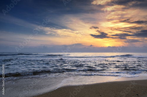 Amazing nature seascape background with beautiful color of sunrise, Soft focus due to long exposure.