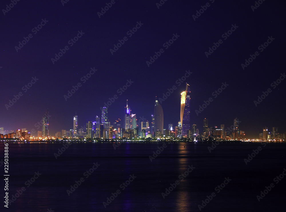 The Skyline Of Kuwait City At Night Glitters With Light