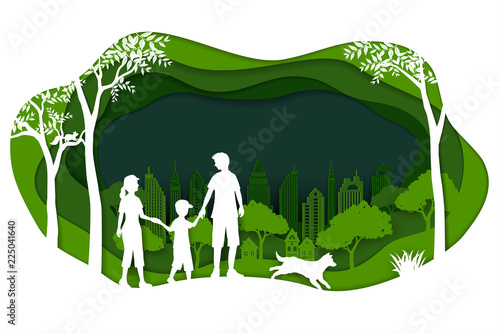 Landscape with eco green city and happy family on paper art background