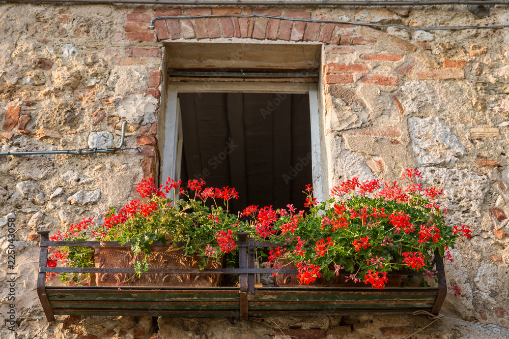 Flowerbox in a small town in Tuscany, Italy
