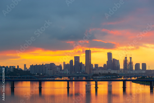 City and building silhouette against the sky on sunset in Seoul,South  Korea   © Toowongsa