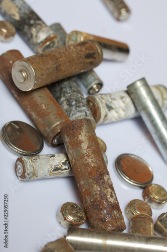 The fulfilled batteries of the different size covered with corrosion. Recycling.
