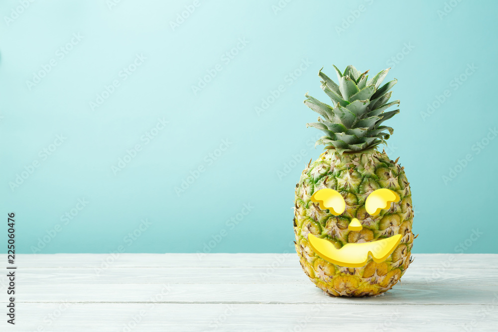 Fototapeta premium Halloween holiday concept with jack o lantern pineapple
