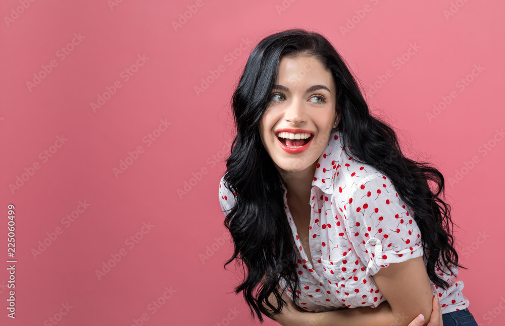 Happy young woman on a solid background Happy young woman on a solid background