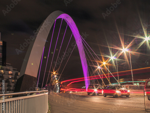 Light trails at night over a bridge in glasgow