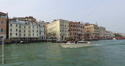 Point of View shot of boats moving in Grand Canal with building in background