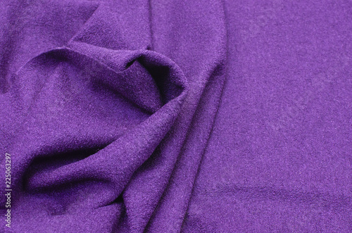 Knitted fabric is dark purple photo