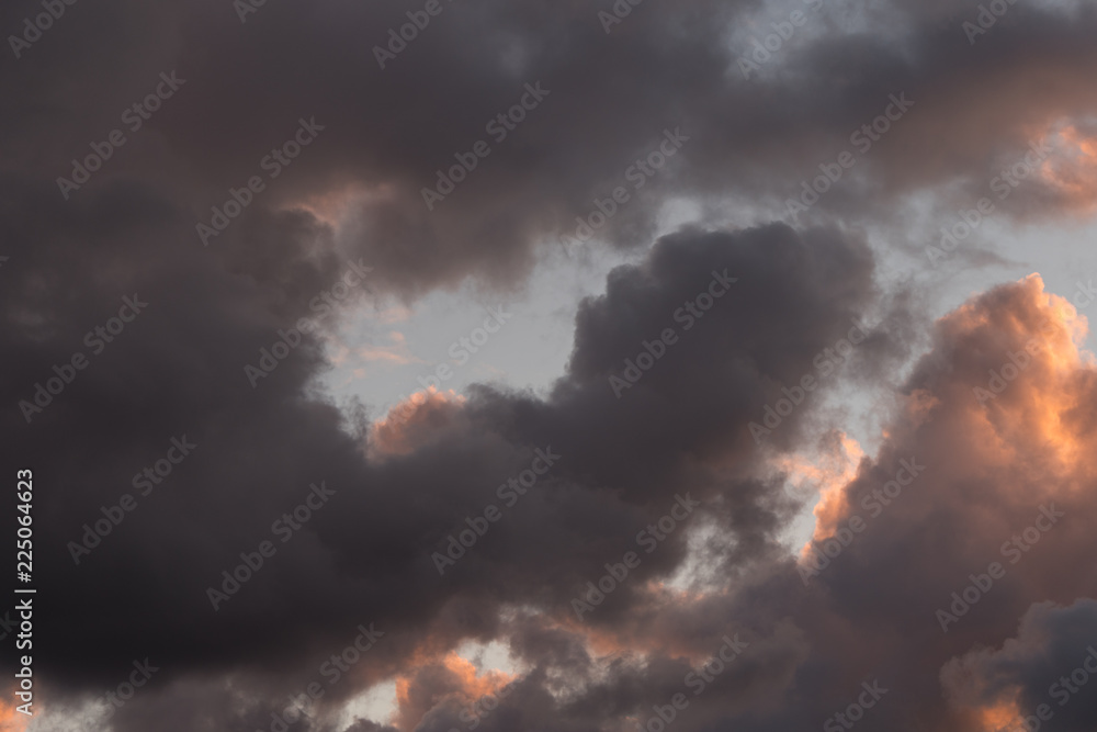 Storm clouds in the sunset light