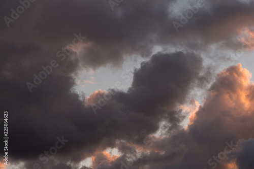 Storm clouds in the sunset light