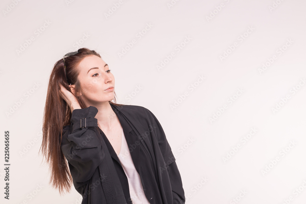 fashion, modeling and people concept - young asian woman looking at something romantic over white background with copy space fashion, modeling and people concept - young asian woman looking at something romantic over white background with copy space