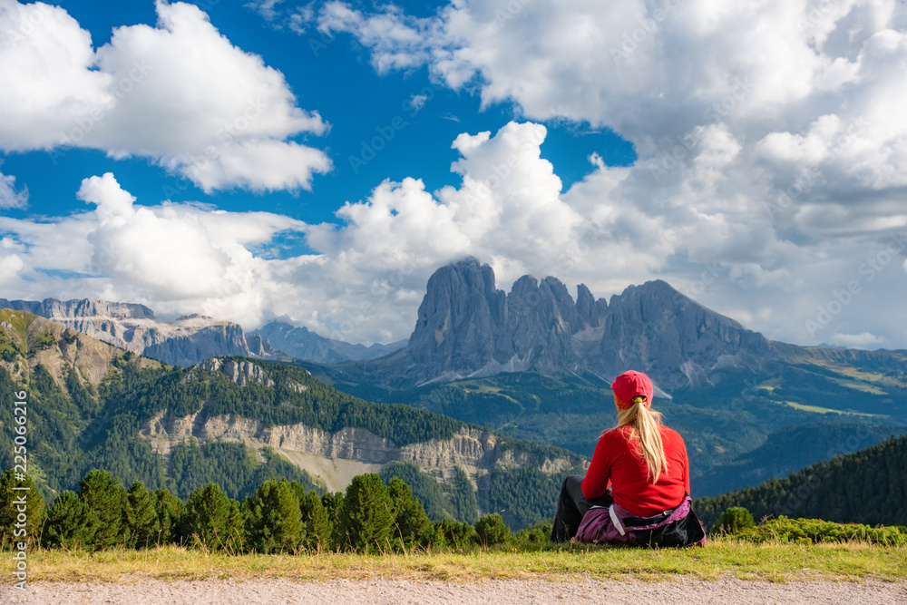 Sporty Young woman on mountain trail Dolomites Mountains, Italy Sporty Young woman on mountain trail Dolomites Mountains, Italy