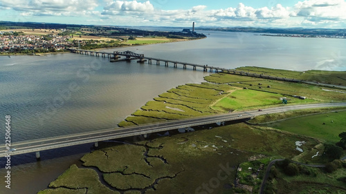 Aerial image of traffic crossing Clackmannanshire Bridge and Kincardine Bridge over the River Forth.