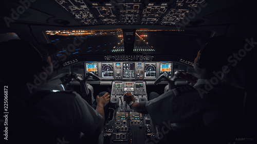 Slika na platnu Modern Aircraft Cockpit Night Landing