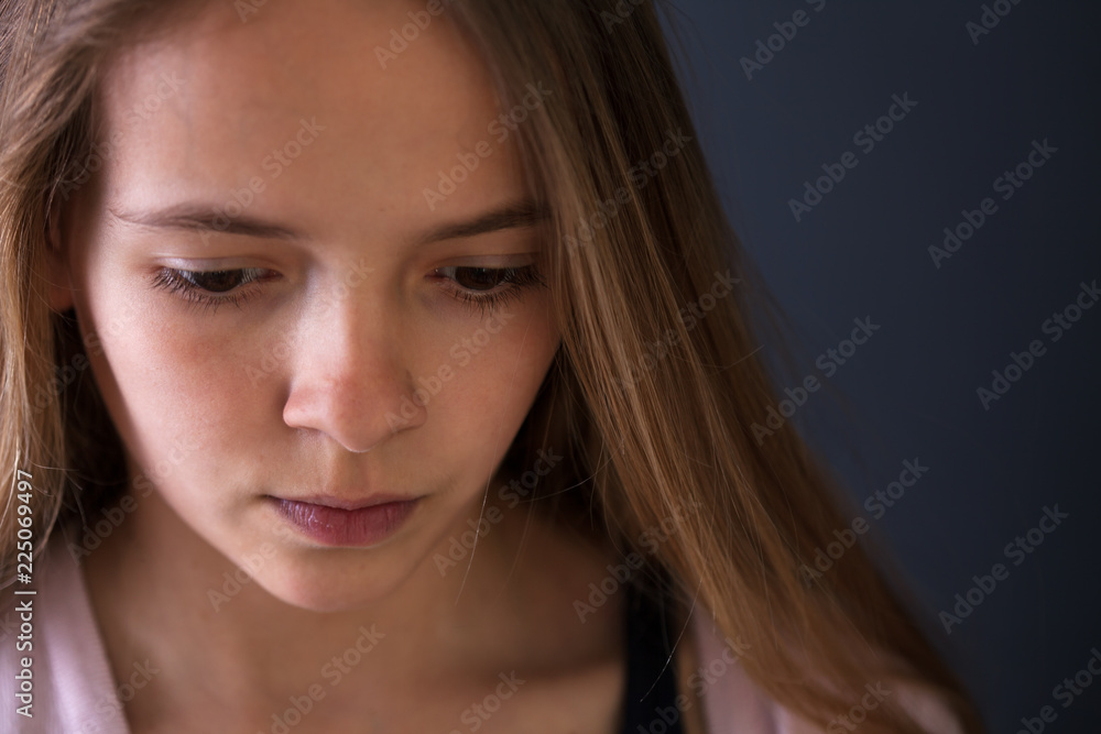 Pensive teenager girl closeup portrait Pensive teenager girl closeup portrait