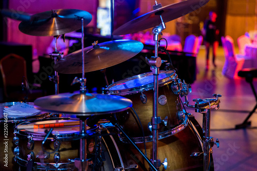 Drums stand in a restaurant blurred background