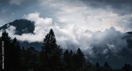 stormy weather in mountains ,clouds ,foggy in bled slovenia