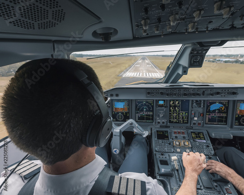 Pilot Landing Modern Passenger Aircraft