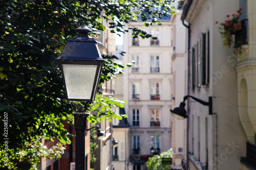 Landmark view of Paris Montmartre with streetlight at summer