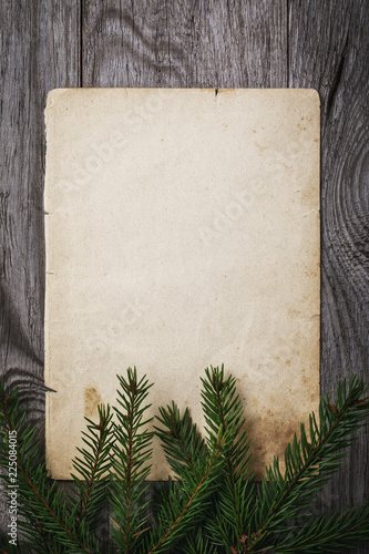Letter to Santa Claus. Old sheet of paper with copy space on wooden table, top view