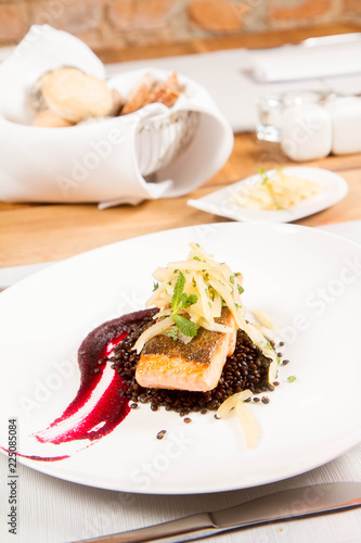 Baked salmon, beetroot mousse, black lentils and pear