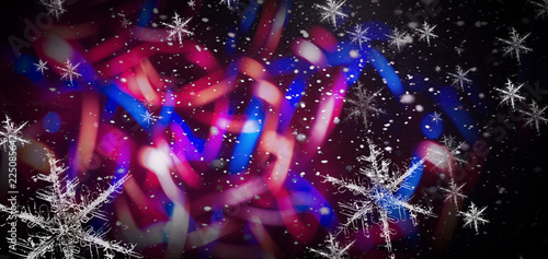 Winter  snow  background. Abstract dark bokeh background with snowflakes.