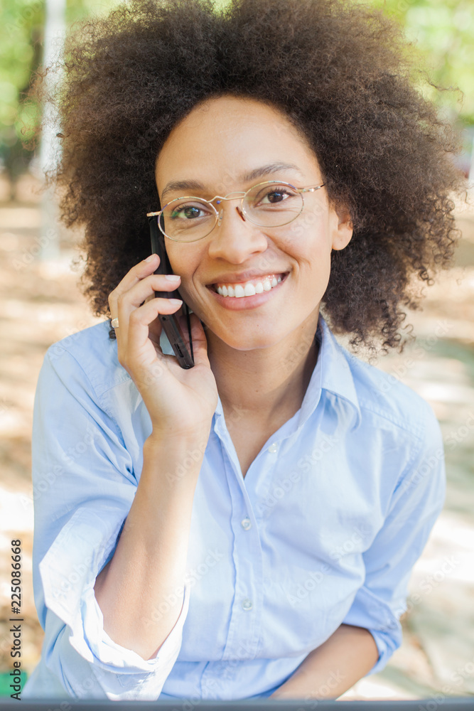 Beautiful Young Afro American Student Woman Speaking With Phone Outdoor Beautiful Young Afro American Student Woman Speaking With Phone Outdoor