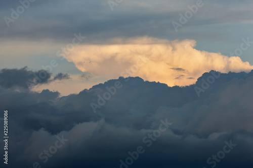 Dramatic clouds at sunset. Cloud illuminated by the sun