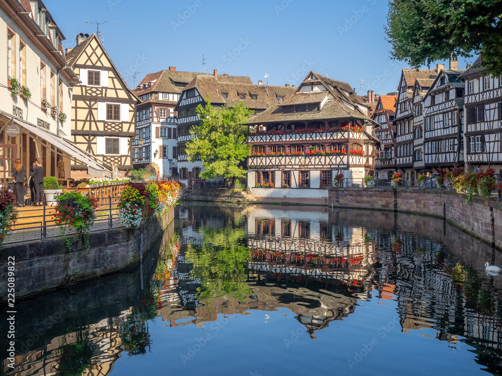 View along the Ill River in Petite France areas of Strasbourg in the Alsace region of France. View along the Ill River in Petite France areas of Strasbourg in the Alsace region of France.