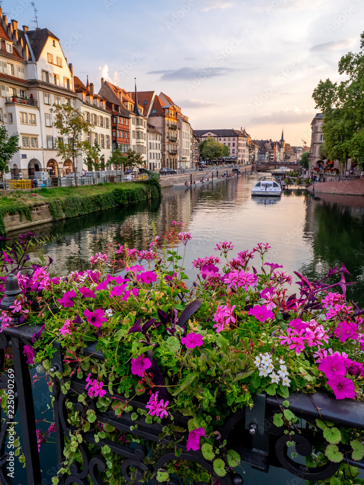 View along the Ill River in historic areas of Strasbourg in the Alsace region of France. 