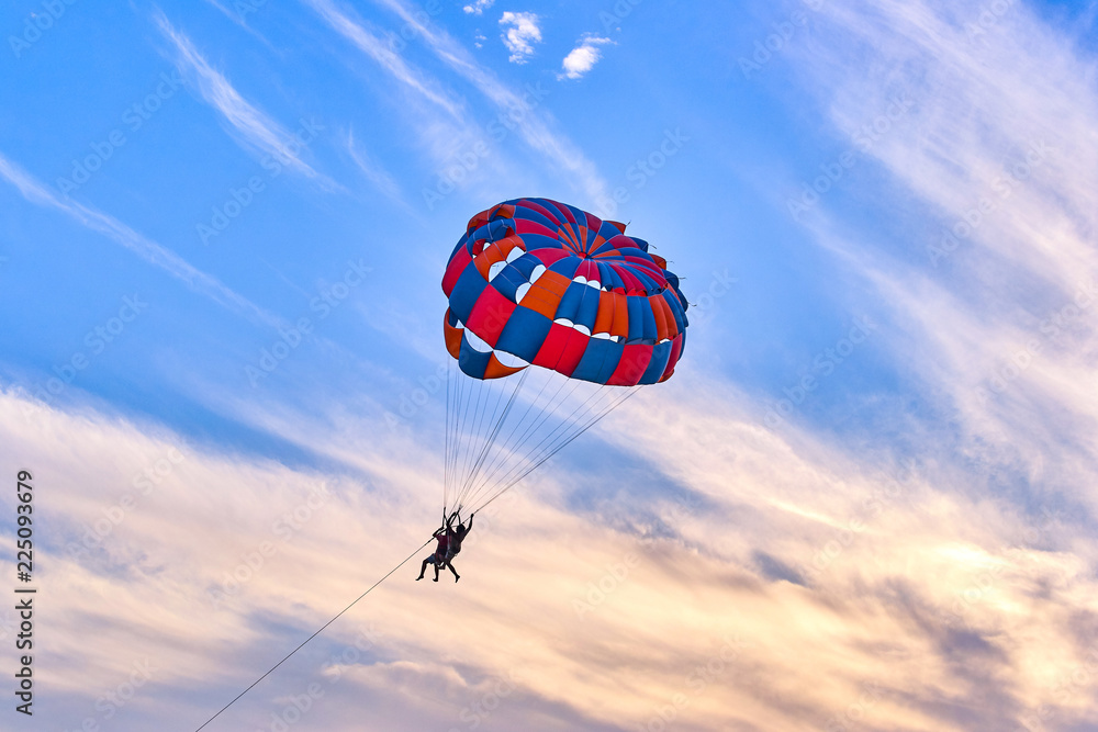 Parasailing at sunset Parasailing at sunset