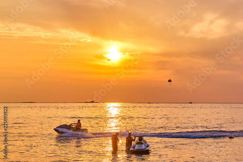 Water bike at sunset ocean bay view