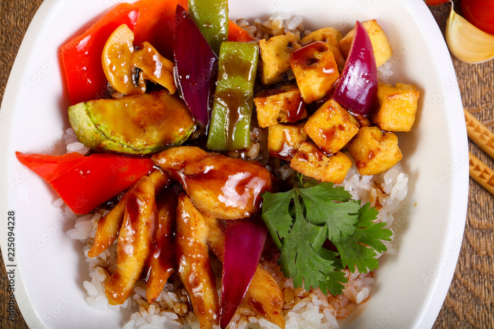 Wok with rice, cheese and tofu Wok with rice, cheese and tofu