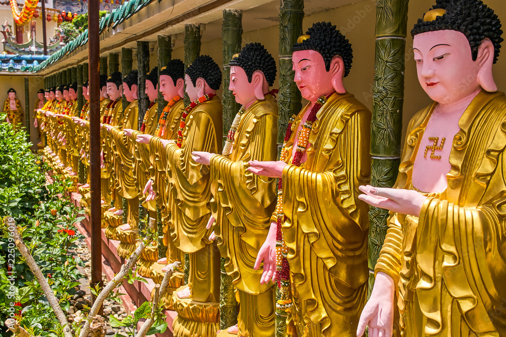 Fototapeta premium Buddha statues in Kek Lok Si Temple on Penang island, Georgetown, Malaysia